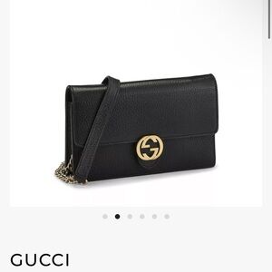 Gucci Black Leather Clutch with Gold Accent